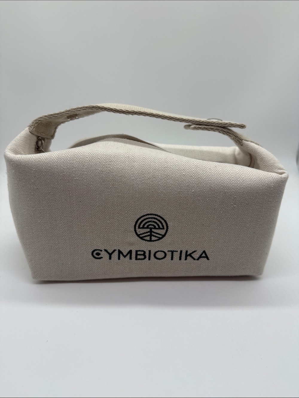 Cymbiotika Off White Herringbone Canvas Toiletry Cosmetic Travel Bag NWOT